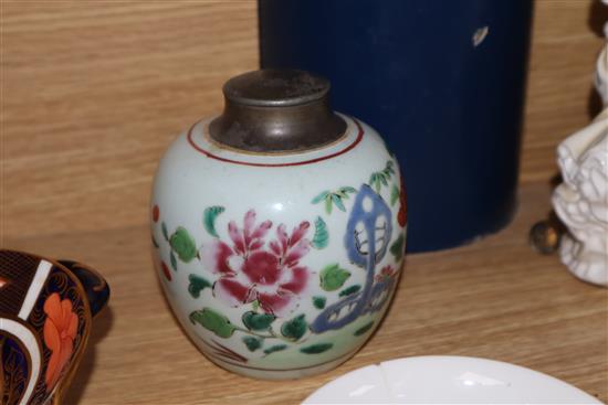 A Chinese dragon lidded tea bowl, a vase with metal cover and a stand